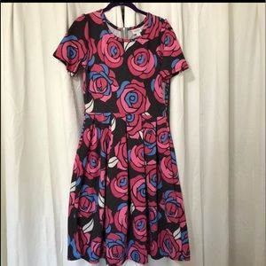 NWT Size L LuLaRoe Amelia dress. Gray background with all over Disney rose print